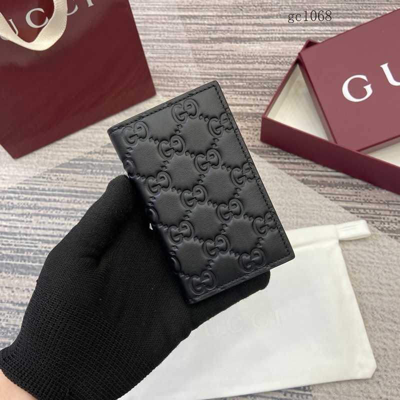 Gucci專櫃2026新款男女錢包 古馳Emblem系列黑色全皮錢夾 850183 gc1068